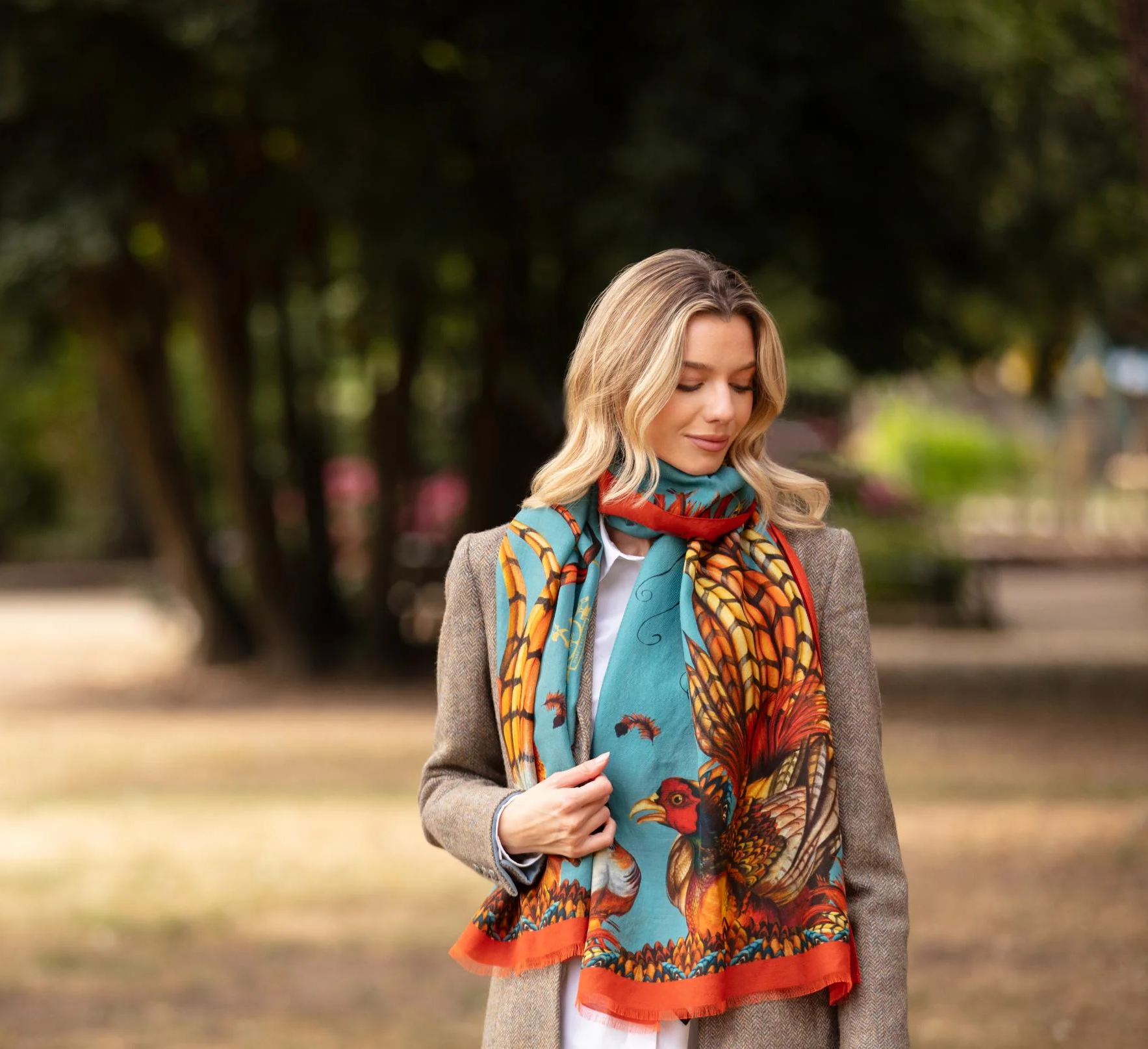 Elegant woman wearing silk scarf